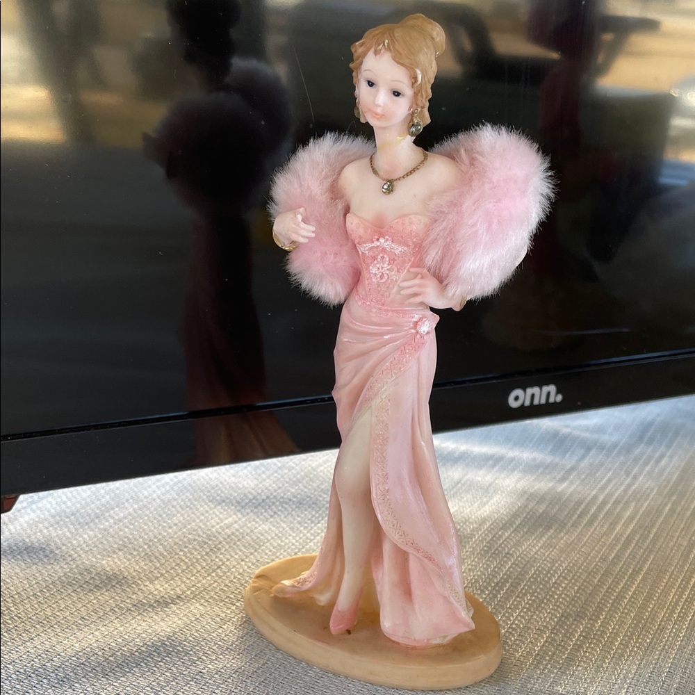 On Running Pink Figurine with Feathered Shawl